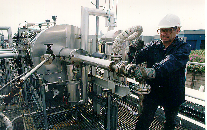 H2S burner pilot equipment used for validating computational fluid dynamics models of oil refinery processes, showing dedicated measurement infrastructure for multi-million dollar digital twin validation program
